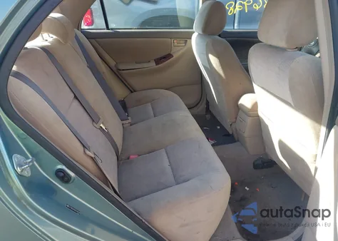 2005 Toyota Corolla Le z USA, uszkodzony, nr VIN 2T1BR32E95C498219